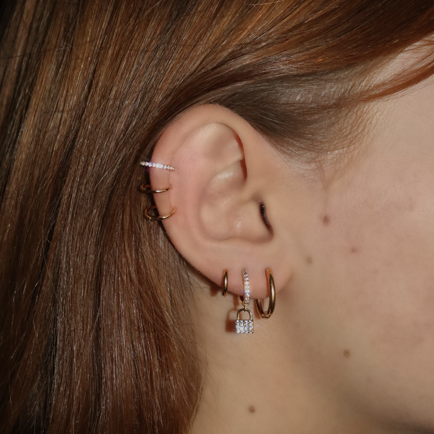 SHINY LOCK HOOP EARRING